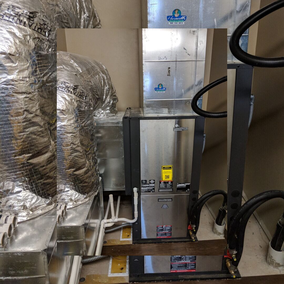 ClimateMaster geothermal heat pump unit installed mechanical room Oklahoma