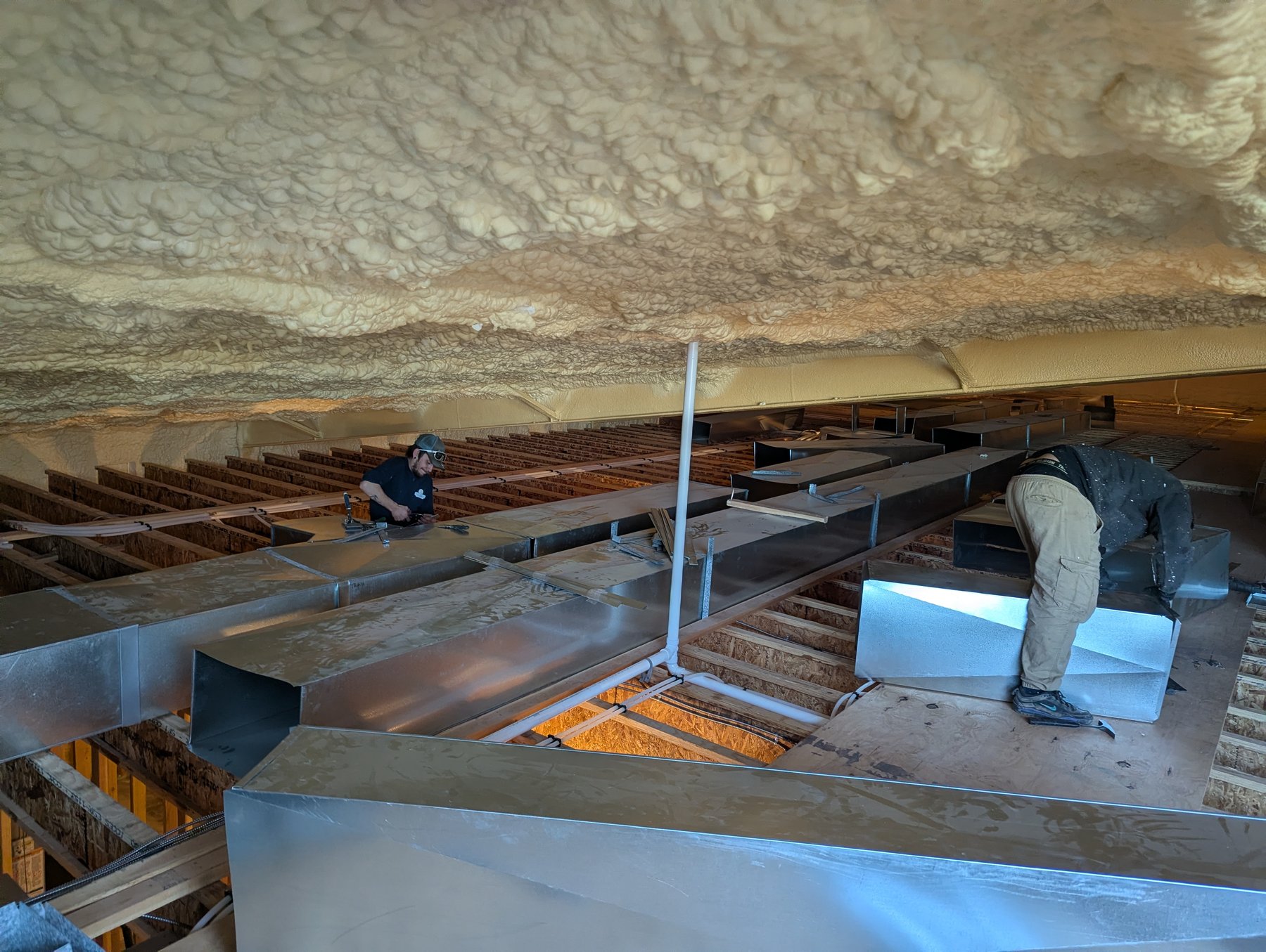 Hartzell’s crew installing ductwork — central Oklahoma