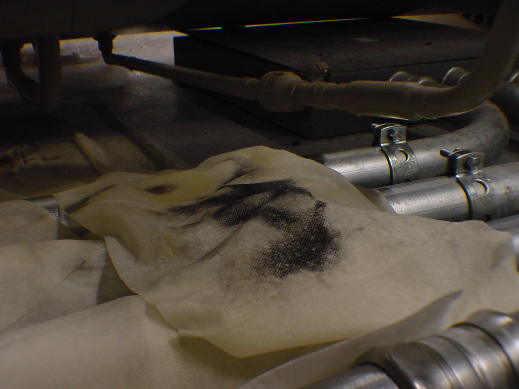 Factory defect evidence burned bearing journal in McQuay centrifugal chiller compressor