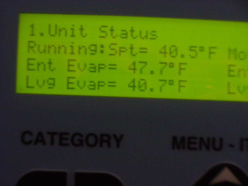 McQuay chiller control panel showing Unit Status Running after successful rebuild and commissioning