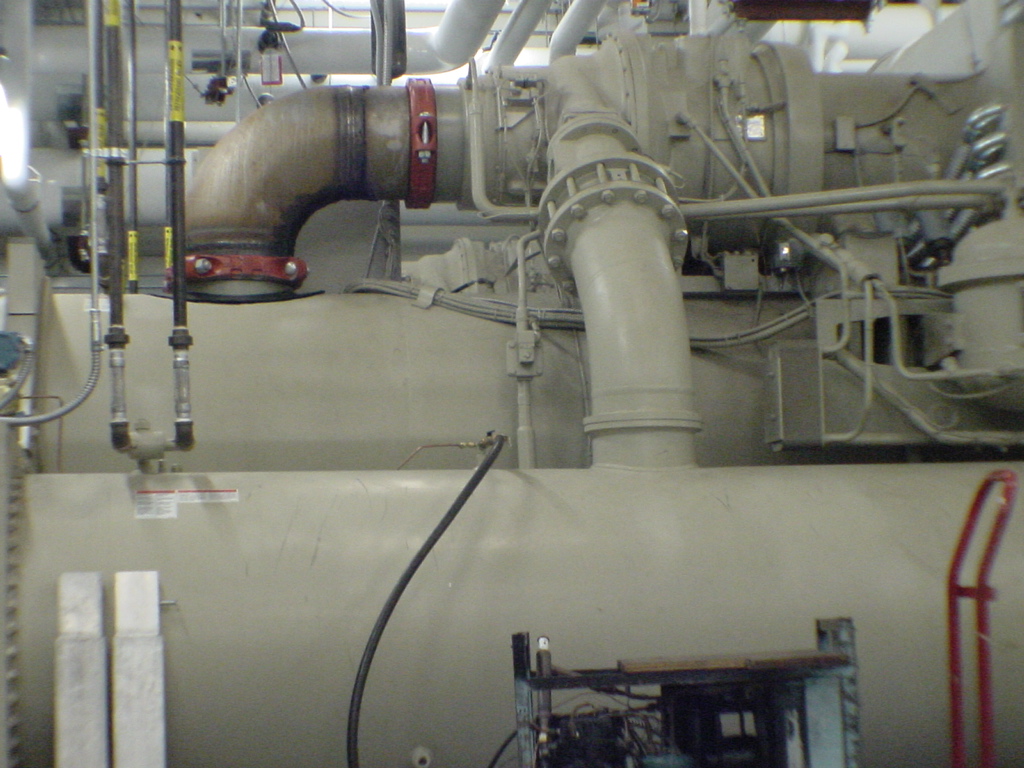 McQuay chiller large-bore flanged refrigerant circuit piping and compressor connections