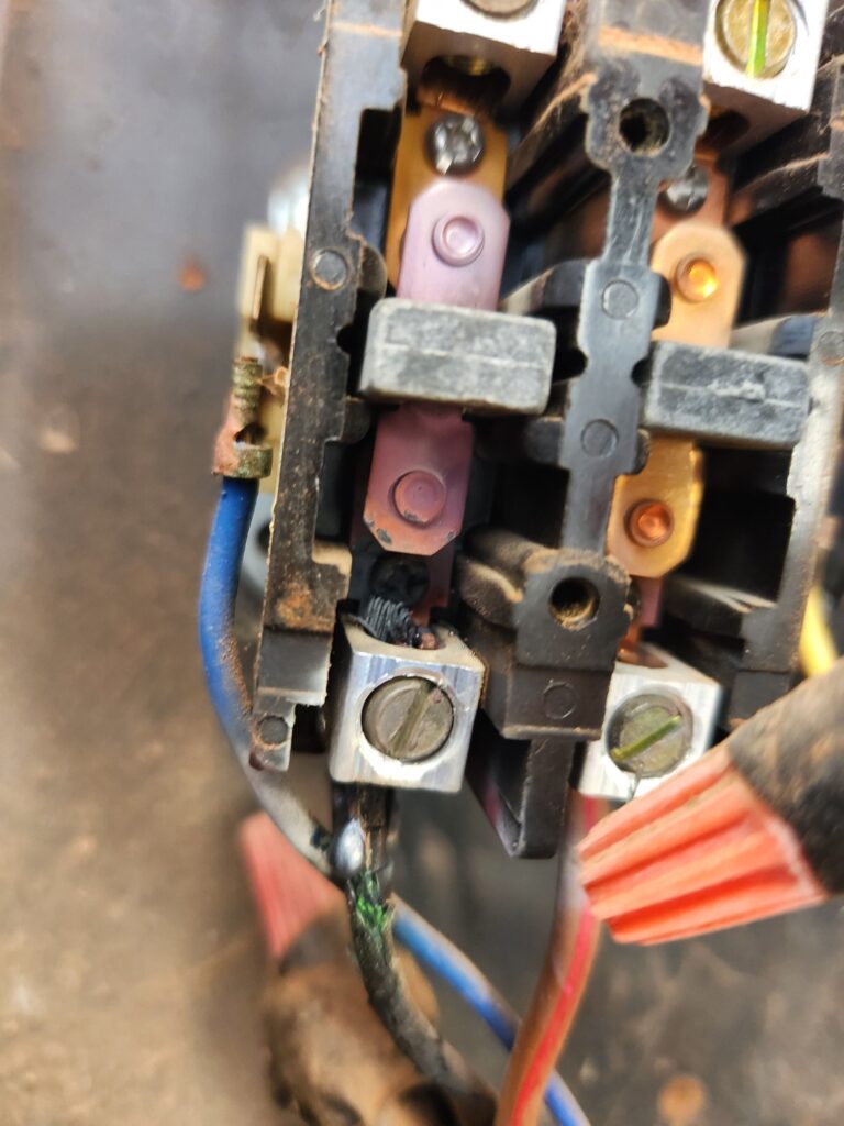 Burnt 2-pole contactor contacts on an HVAC condenser, Hartzell's Heat & Air, Kingfisher OK