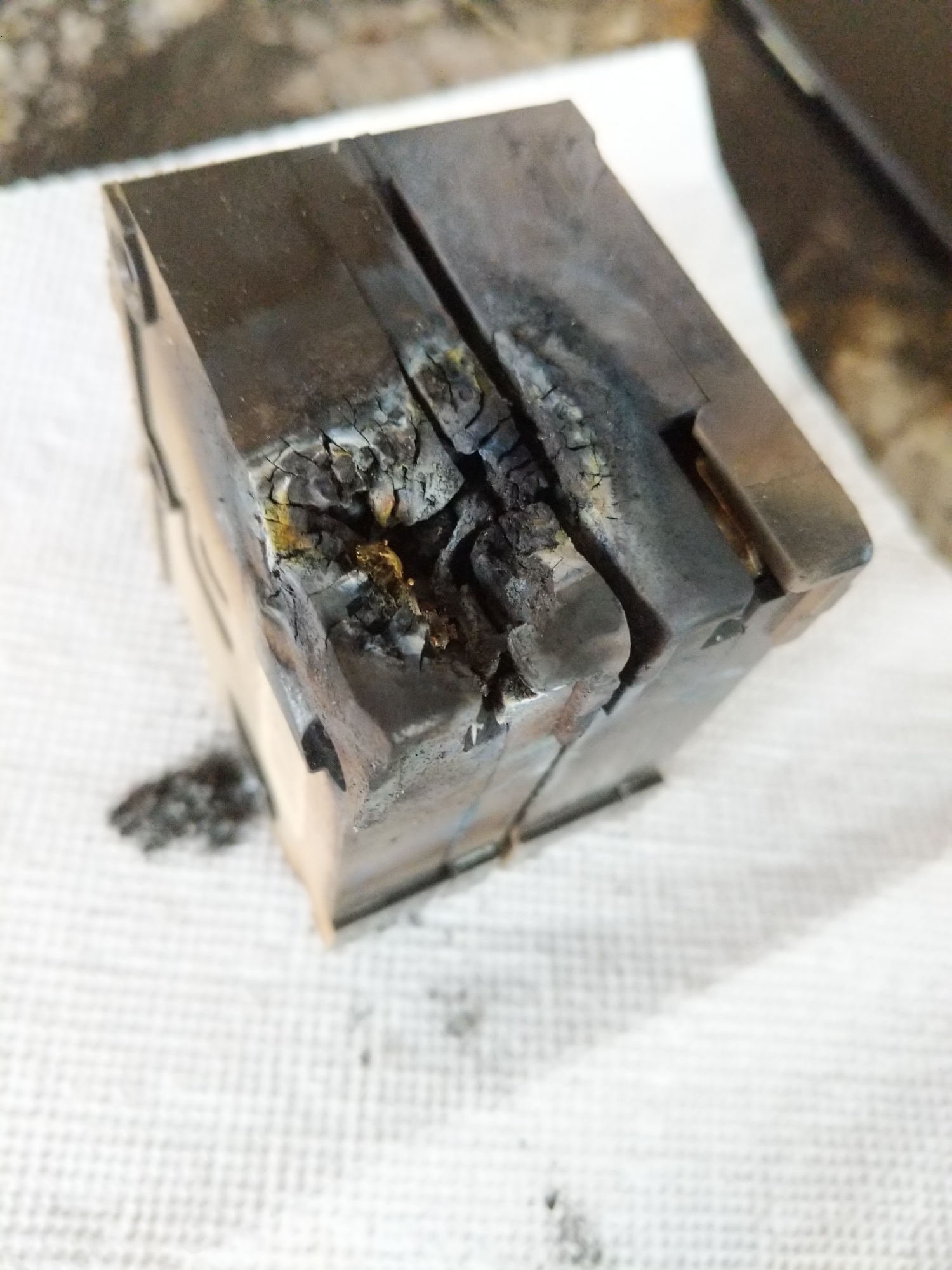 Burned AC contactor showing heat damage and pitted contacts