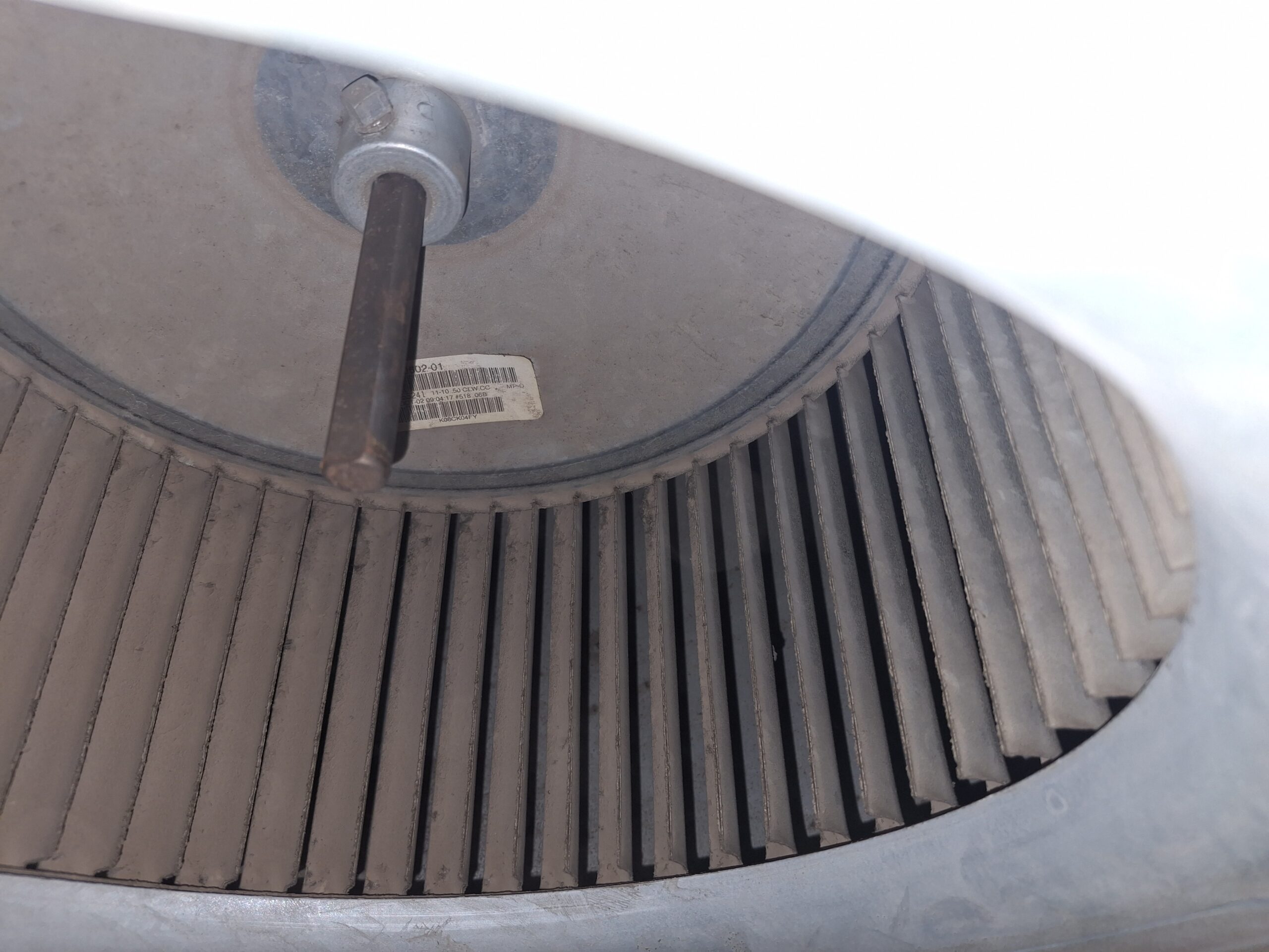 Condenser fan motor assembly on residential outdoor AC unit