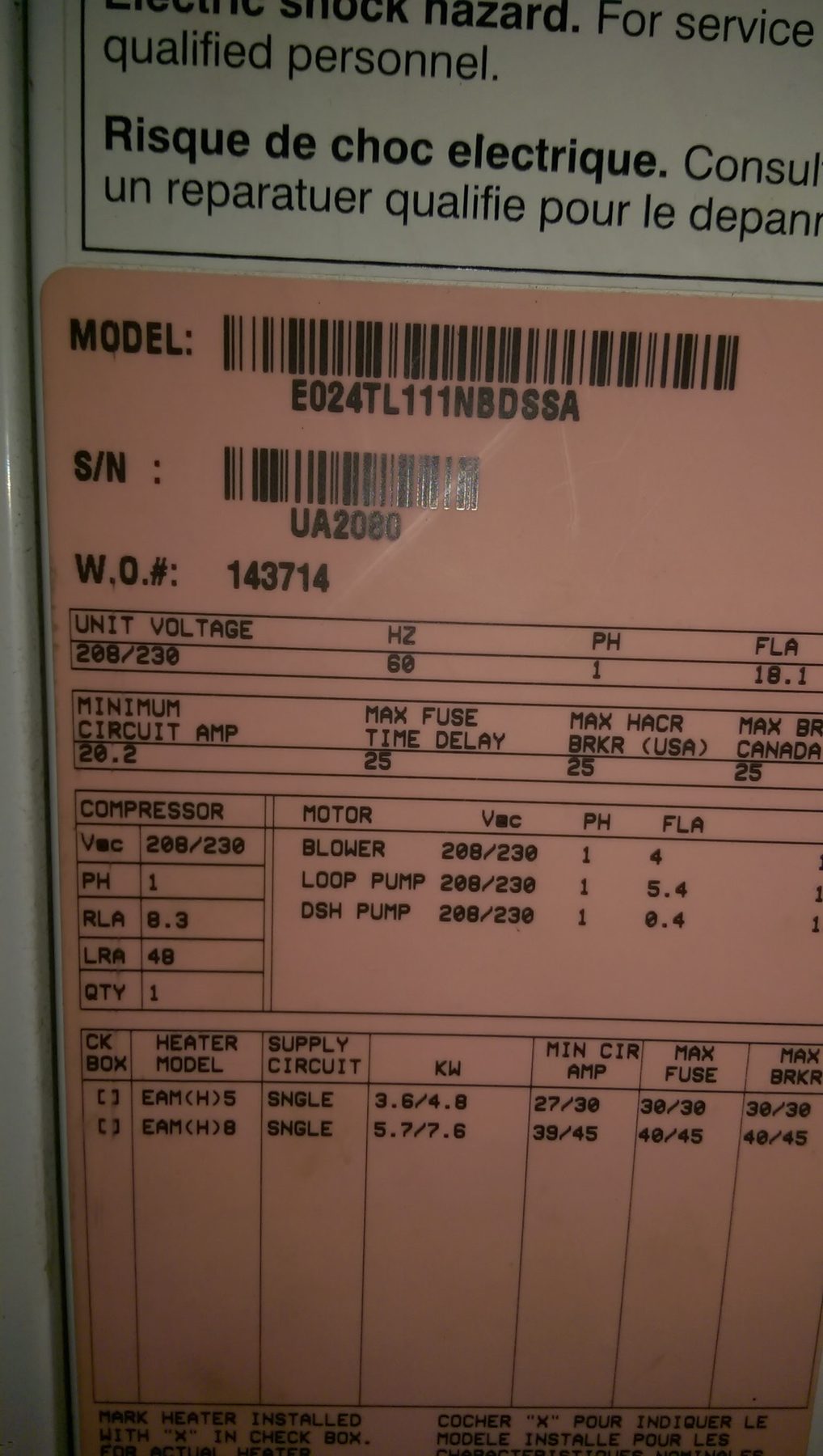 Geothermal heat pump nameplate showing model and capacity on a Hartzell's service call in Edmond Oklahoma
