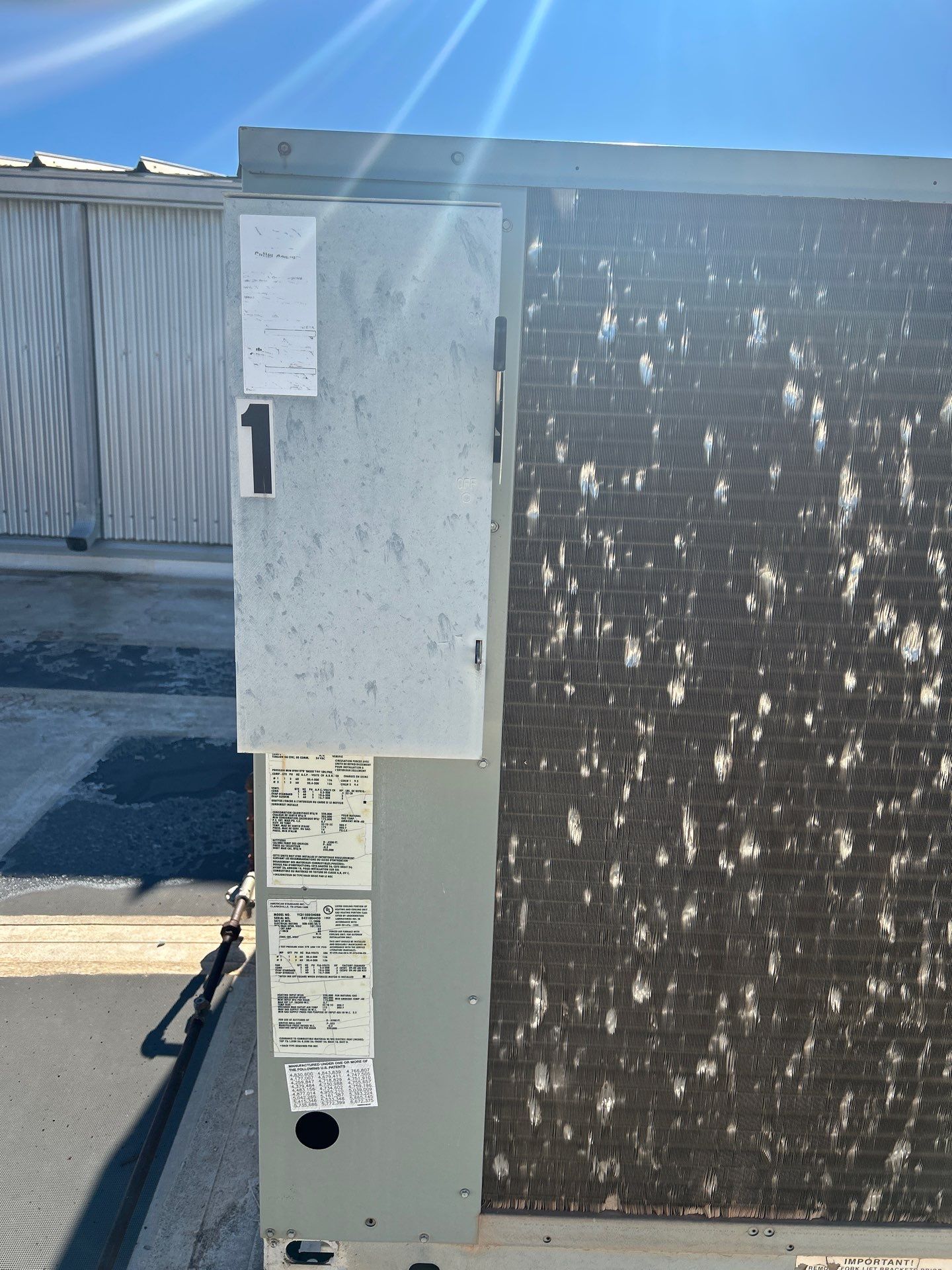 Commercial rooftop HVAC unit service in Kingfisher, Oklahoma, Hartzell's Heat & Air