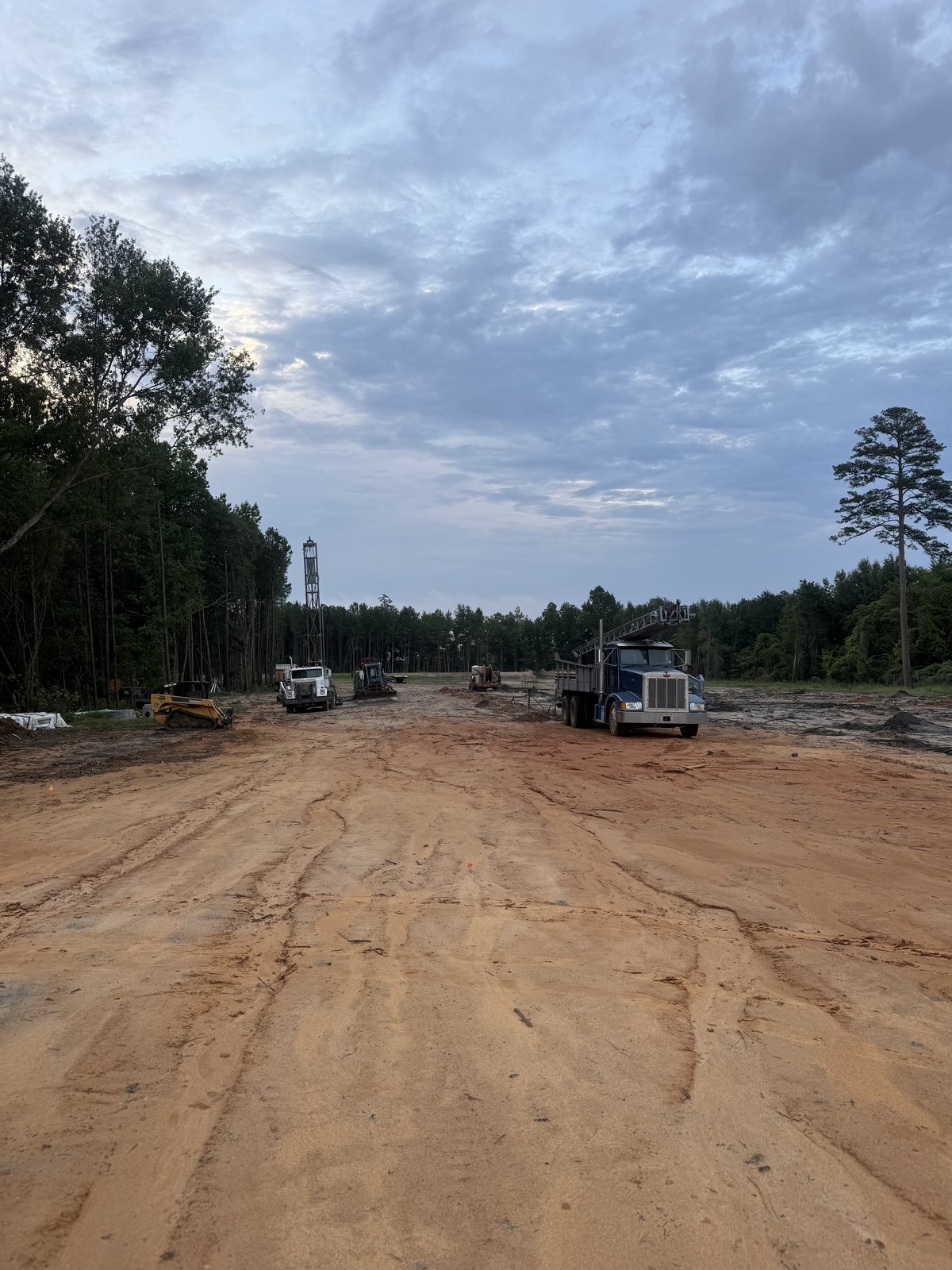 Geothermal drilling equipment and vertical bore site work.