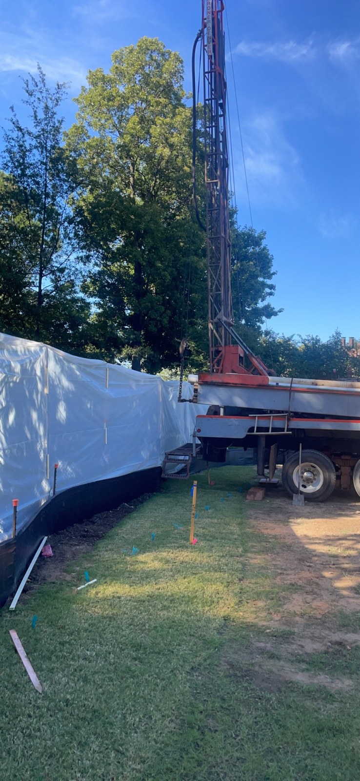 Geothermal drilling equipment and vertical bore site work.