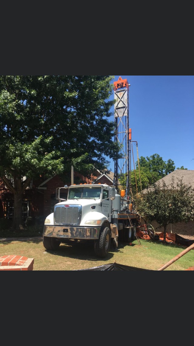 Geothermal drilling equipment and vertical bore site work.