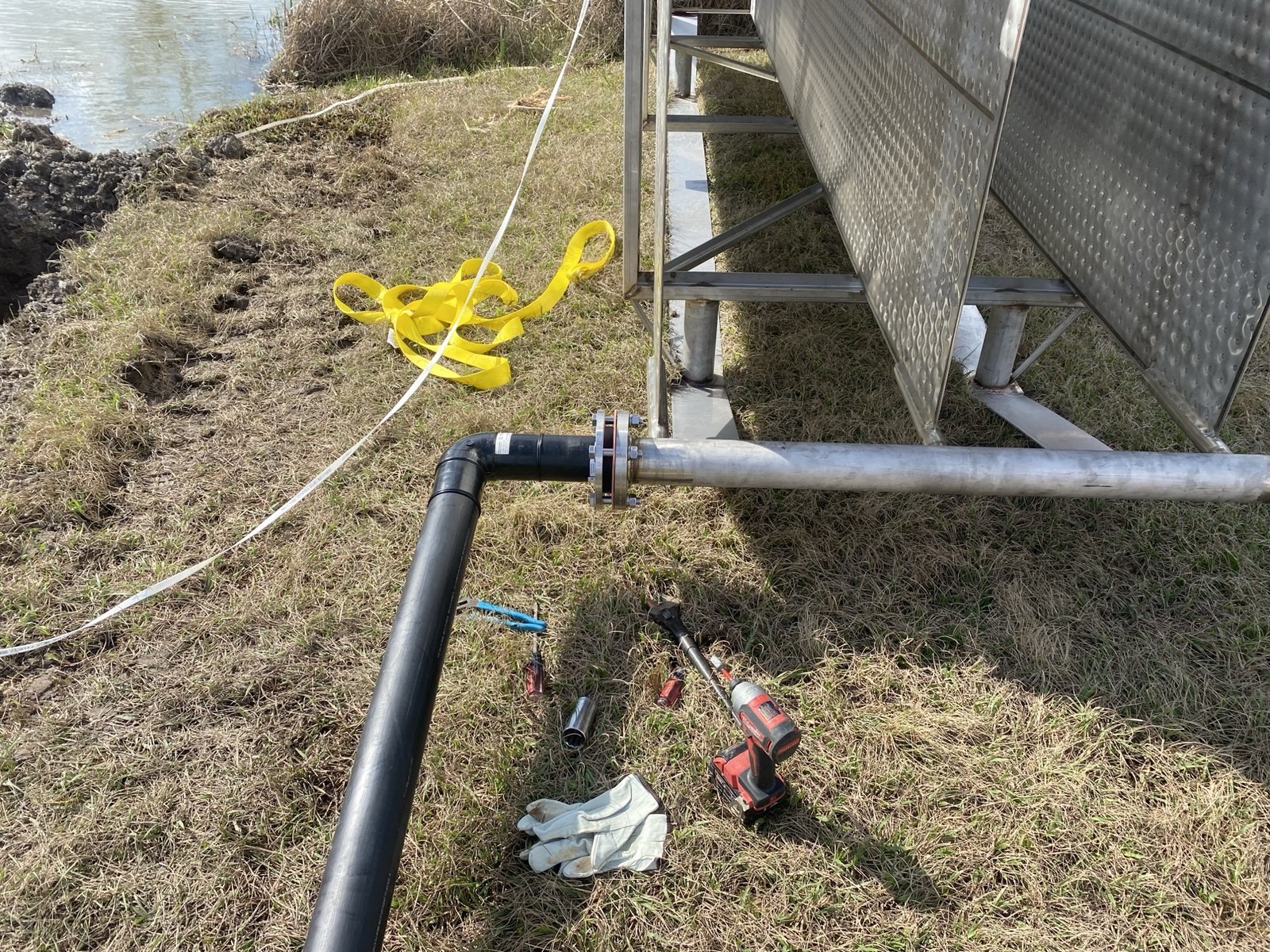 Geothermal pond loop piping and site conditions.
