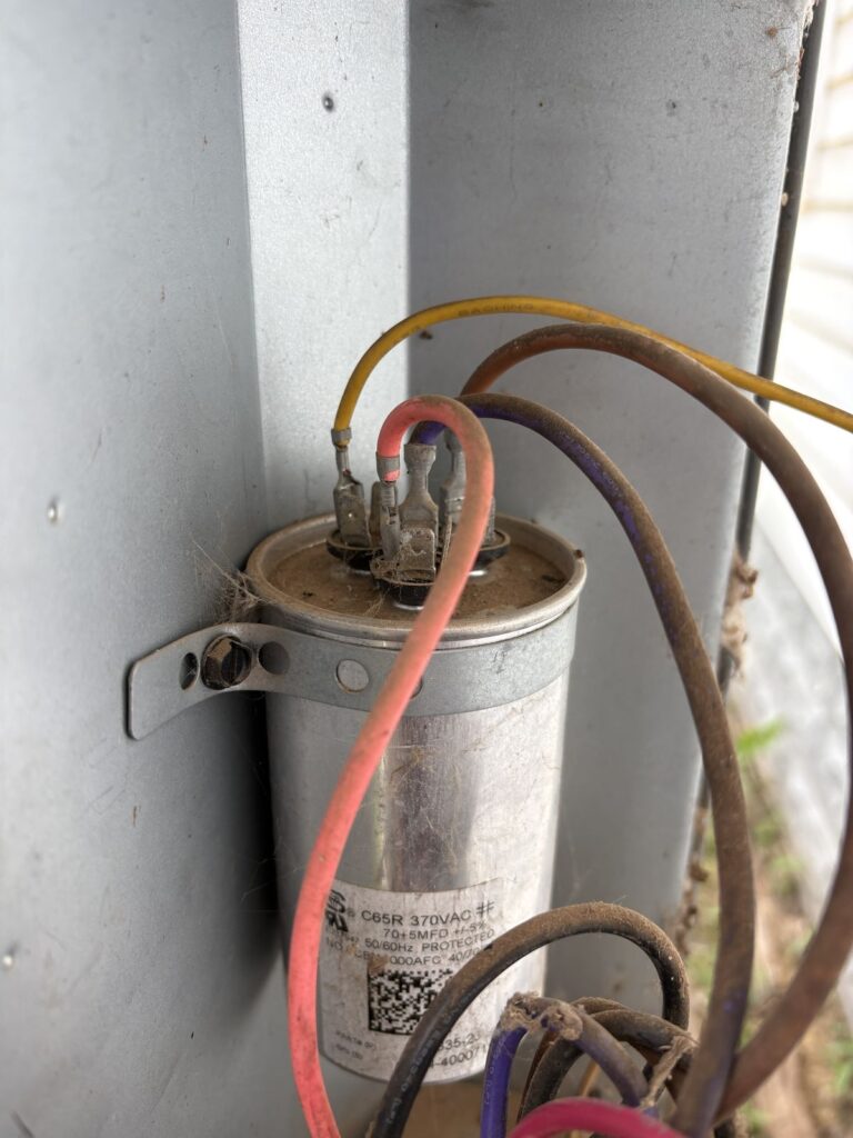 Run capacitor inside an outdoor AC unit, AC electrical repair in Kingfisher, OK