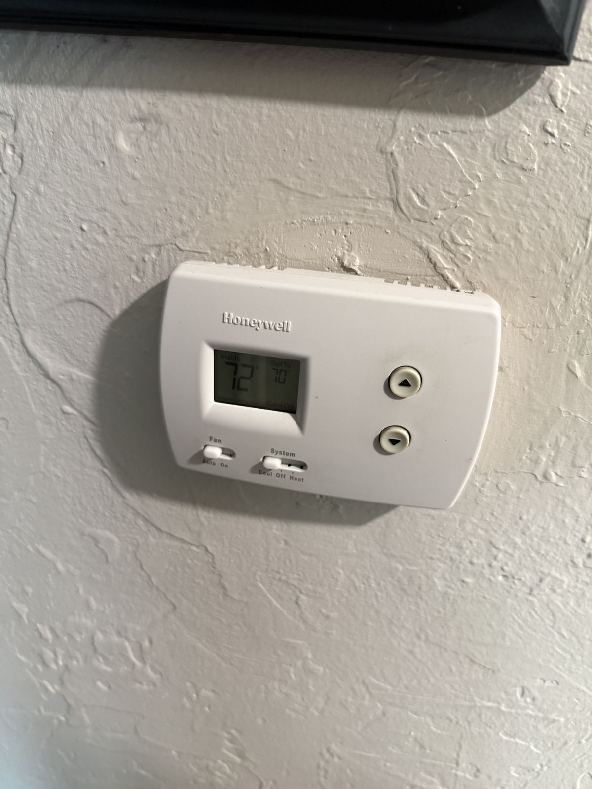Wall thermostat, AC repair in Edmond, OK