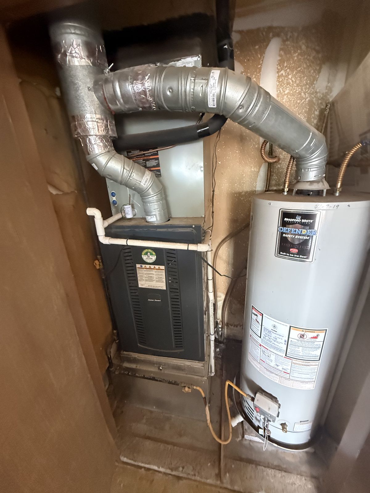 Furnace and water heater in a closet, AC tune-up in Kingfisher, OK