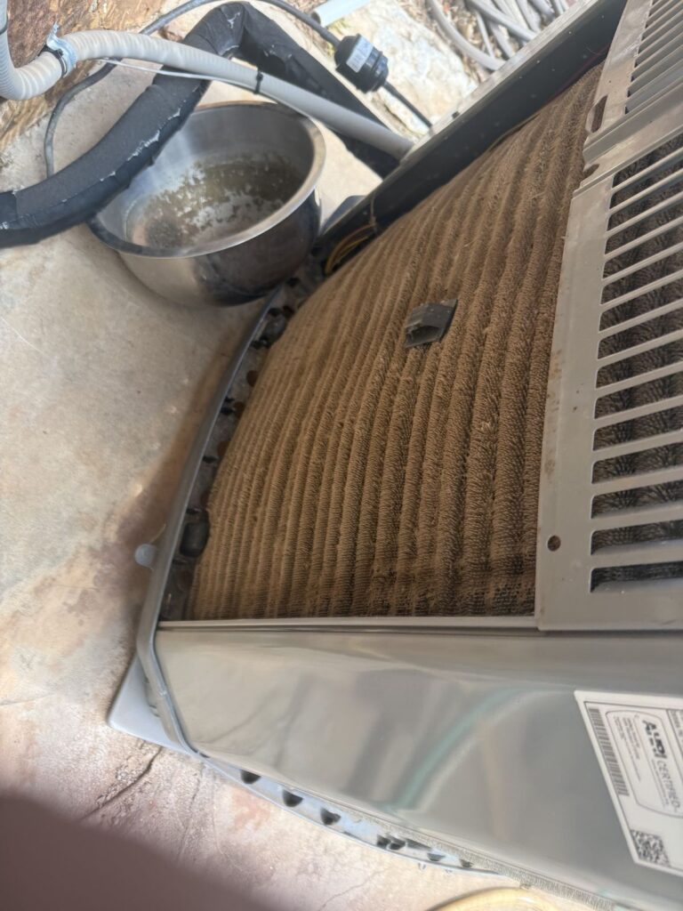 Outdoor condenser coil packed with dirt, AC tune-up in Kingfisher, OK