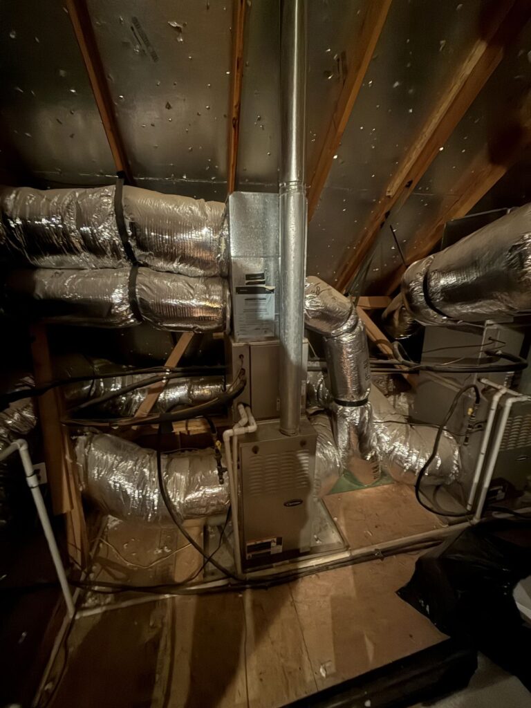 Furnace and ductwork in a Kingfisher attic