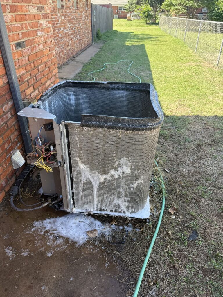 Cleaning an outdoor condenser coil, air conditioning service in Kingfisher, OK