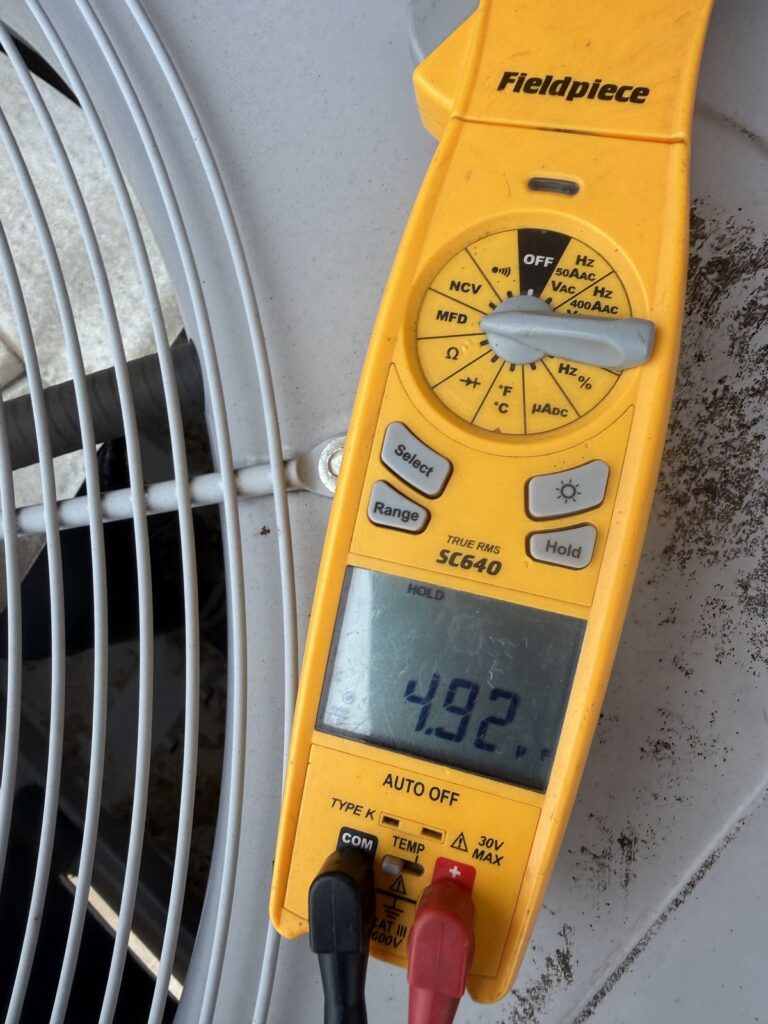 Meter reading taken at an outdoor condenser, air scrubber hookup in Okarche, OK