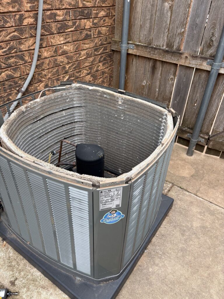 Outdoor unit with its top panel removed in Kingfisher