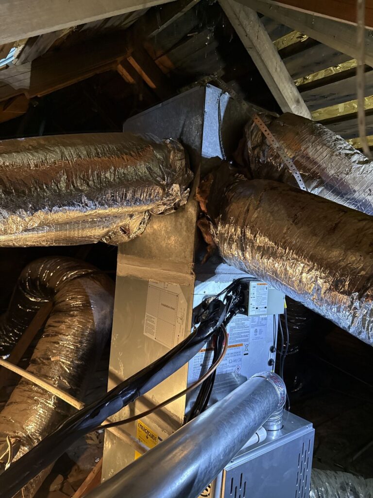 Furnace and ductwork in an attic, new AC and gas furnace in Kingfisher, OK