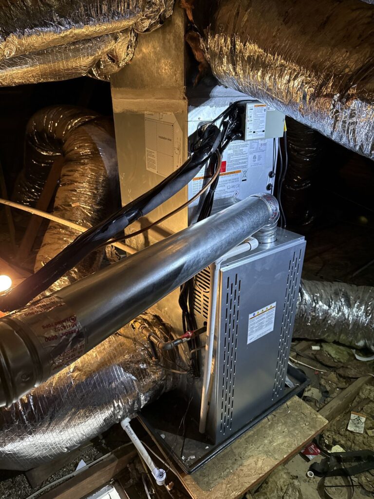 Furnace and ductwork in an attic in Kingfisher