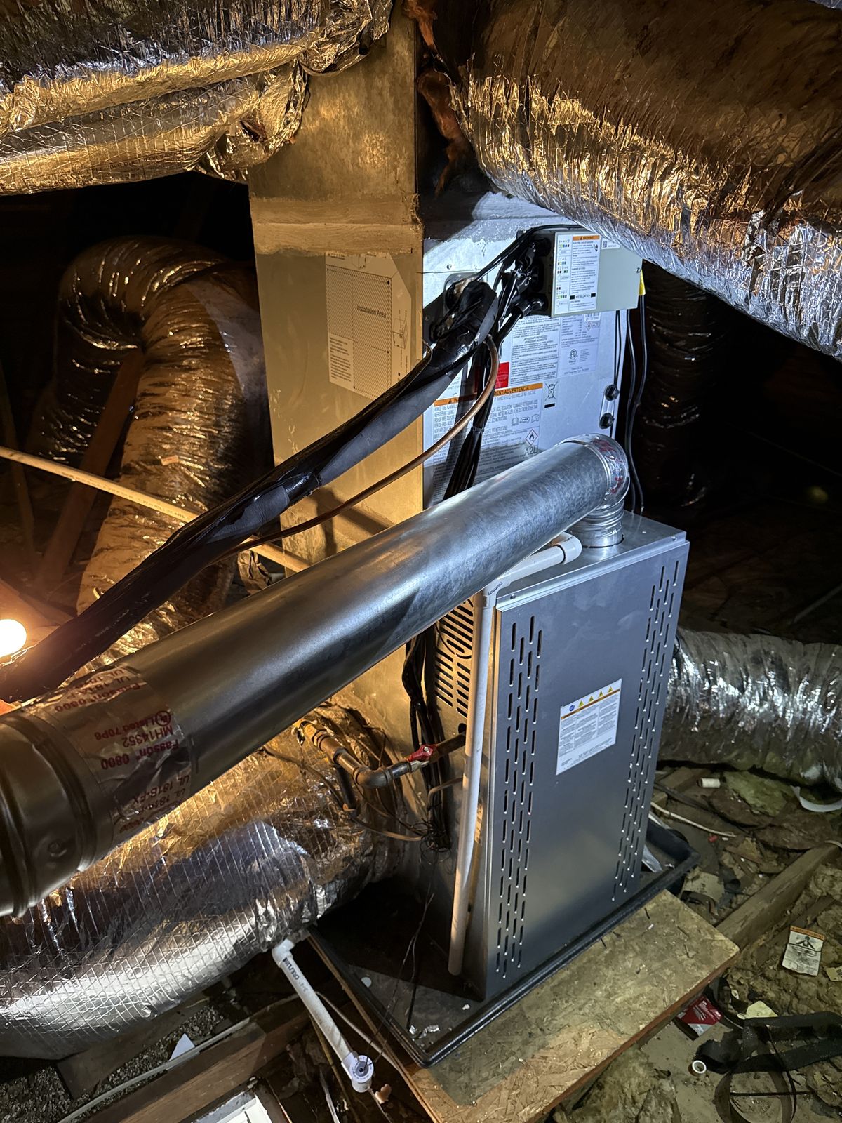 Furnace and ductwork in an attic, new AC and gas furnace in Kingfisher, OK